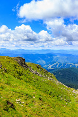 Naklejka premium Picturesque Carpathian mountains landscape in summer, view from the height, Ukraine.