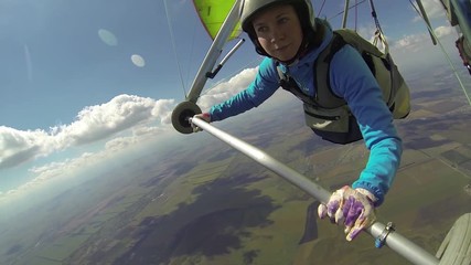 Young woman handle her hang glider