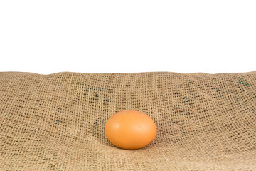 egg placed on sackcloth