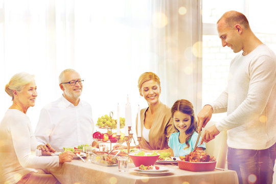 Smiling Family Having Holiday Dinner At Home