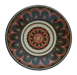 Ceramic plate painted in flanders technology on a white backgrou