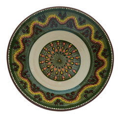 Ceramic plate painted in flanders technology on a white backgrou