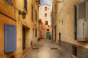 picturesque alley with entwined houses in Antibes, Cote Azur, France