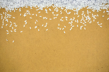 fragment paper from perforation placed on cardboard