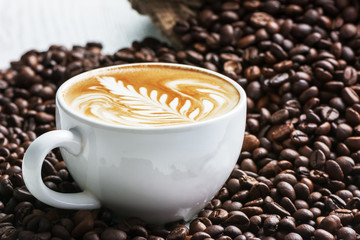 Hot coffee cafe latte with coffee beans