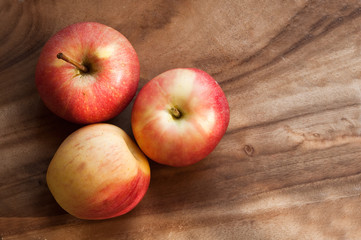 Apples on wooden table 