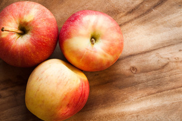 Apples on wooden table 