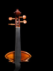 violin rising from water, isolated on black in 