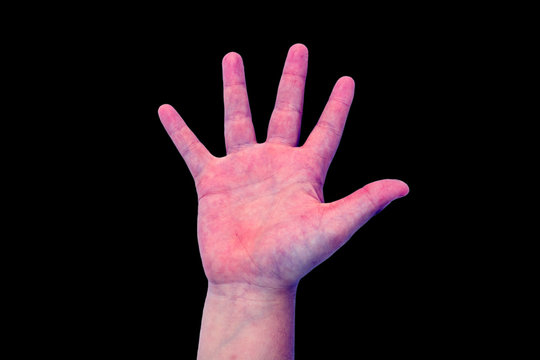 Boy's hand in purple