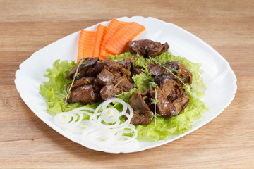 Chicken liver cooked with onions, lettuce and spices