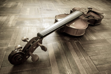 vintage classical violin on wooden floor for music background