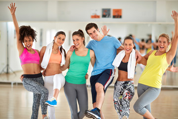 Cheerful young group after training