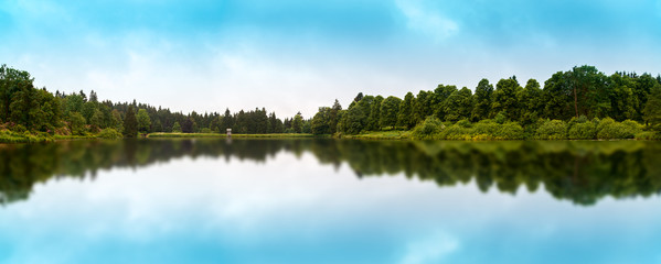 Obraz na płótnie Canvas Kranichsee. The landscape along the river beautiful reflection surface