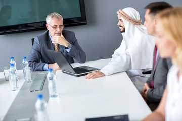 Director  and Arabian partner on meeting
