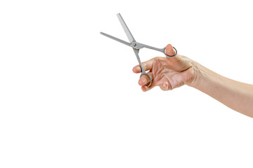 Woman hand is holding thinning scissors