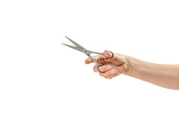 Woman hand is holding scissors isolated on white