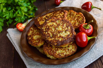 Dietary vegan cutlets of eggplant in a clay bowl.