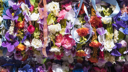 garlands of flowers in a traditional medieval crafts fair in Spa