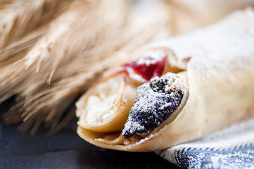 pancake with berries, poppy and cottage cheese