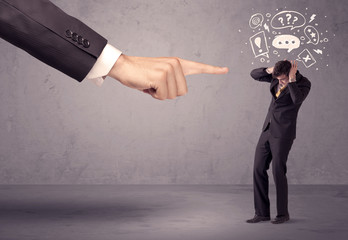 Boss hand pointing at confused employee