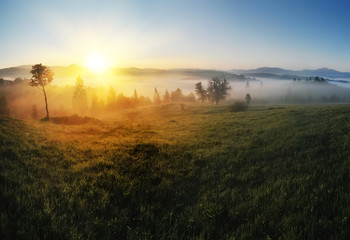 beautiful rural landscape with  mountain view on horizon  and blue sky