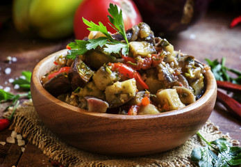 Traditional Caucasian saute from stewed eggplants, fresh vegetab