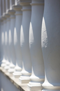 Colonial architectural details in Quito, white columns aligned i