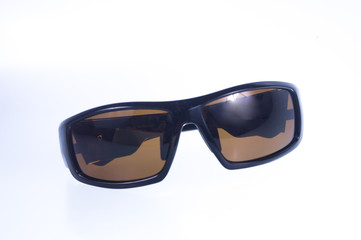 Black men sunglasses on white background. Occhiali da sola da uomo sfondo bianco