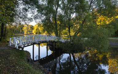 The bridge over the water. Evening in autumn park of Lermontov's estate, Russia.