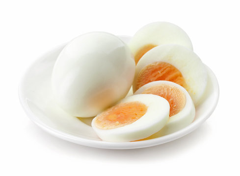 sliced egg on white plate