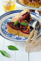 Pie with caramelized plums without gluten in corn flour