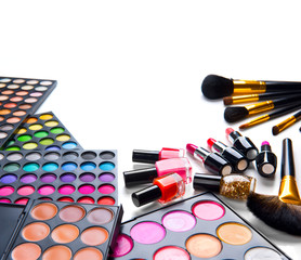 Makeup set palettes with colorful eyeshadows. Various cosmetic brushes