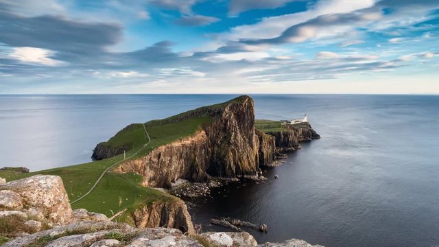 Time Lapse Clip of Sunset Clouds over Neist Point Lighthouse,  Popular Destination Place at West Coast of  the Isle of Skye