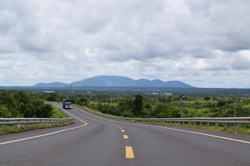 asphalt road lead to the mountain