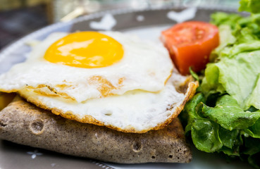 Homemade french buckwheat galette with egg