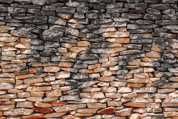 Texture of stone wall with decorative stones