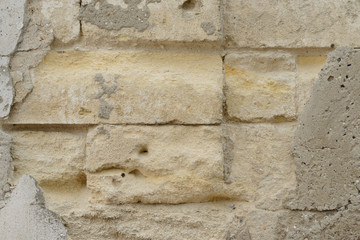 Wall fragment with scratches and cracks