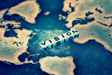 VISION on grunge world map
