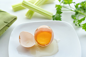 Raw broken egg