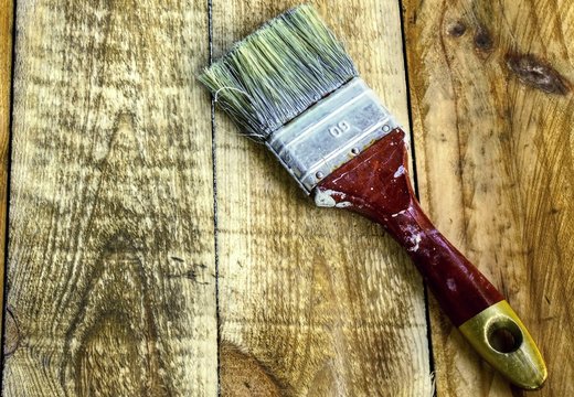 Brush put on the raw wood planks