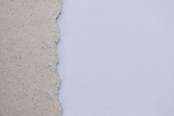 ripped brown paper on white background