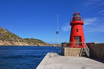 Fototapeta na wymiar Lighthouse in Giglio Island, Tuscany, Italy.