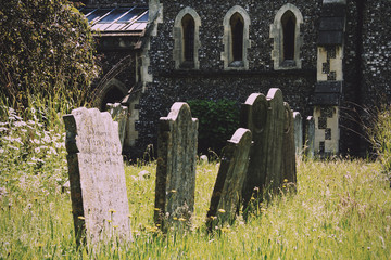 Naklejka premium Grave stones outside a church in Beaconsfield, Buckinghamshire,