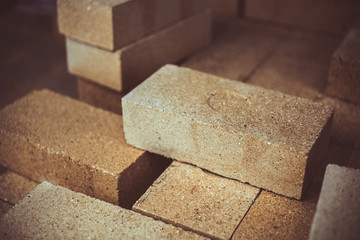 woman on the beach, sitting on a rock Woman, long hair in dress