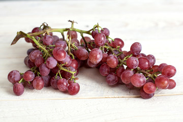 rose grape on a wooden table