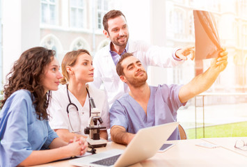 Medical team working at the hospital all together