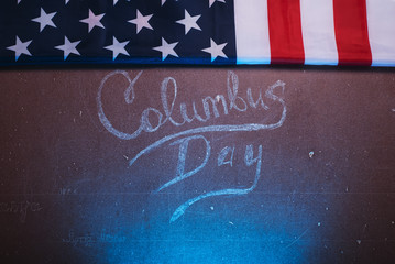 The text on the Board and an American flag,