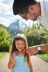Naklejka premium Father And Daughter Having Fun. Happy Dad Playing With Kid