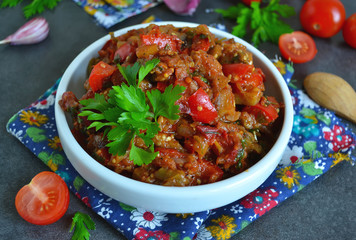 vegetable stew of eggplant on a black background