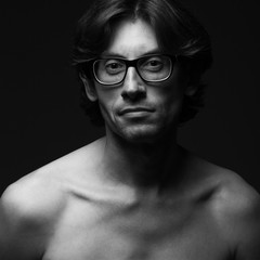 Eyewear concept. Portrait of charismatic mature man wearing glasses